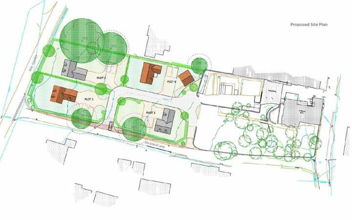 A layout plan of a residential area with homes, trees, and pathways.