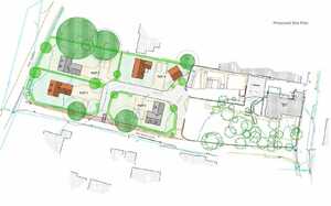A layout plan of a residential area with homes, trees, and pathways.